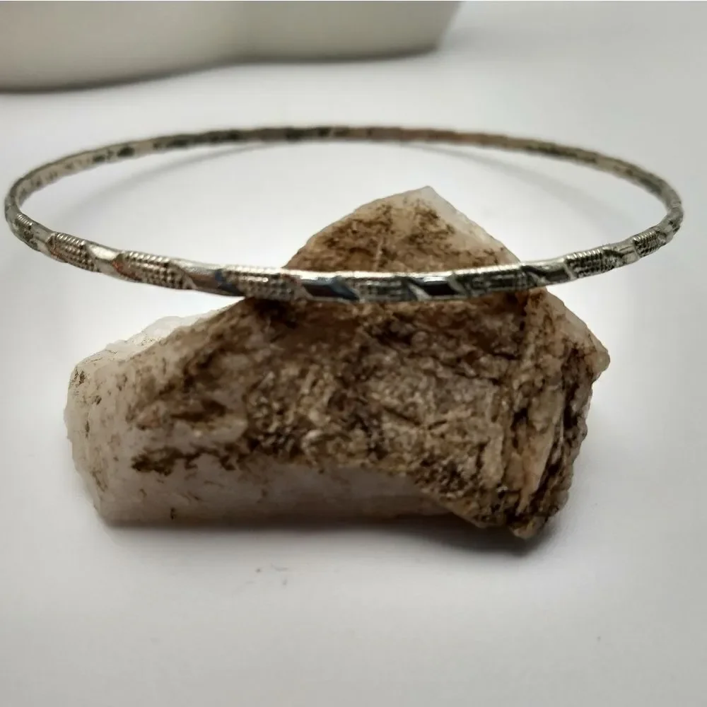 Silver toned Aztec tracks bracelet‎